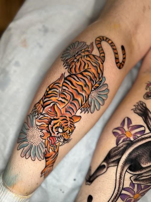 Floating World Tattoos and Body Piercing