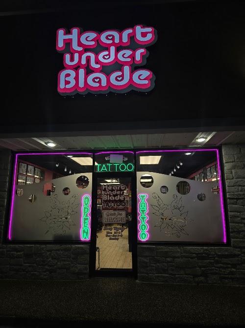 Heart Under Blade Tattoo