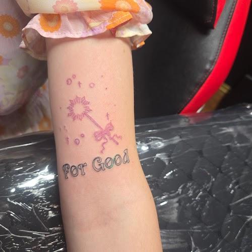 Puncturing Ink Tattoo