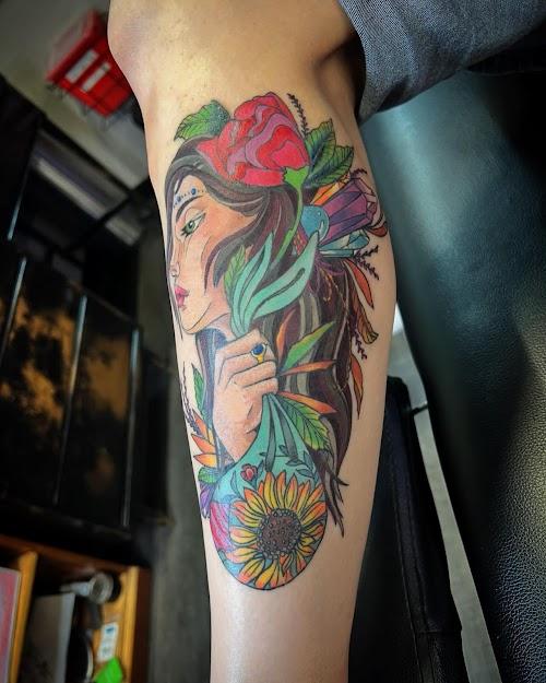 Torn Arts Tattoo