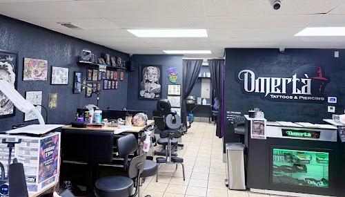 Omertà tattoo and Piercing
