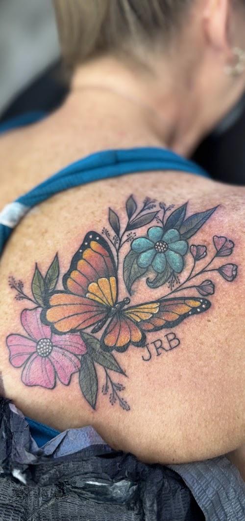 Blue Lotus Piercing and Tattoo