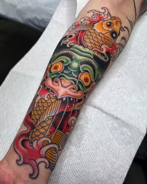 Hand of Mercy Tattoo Parlor