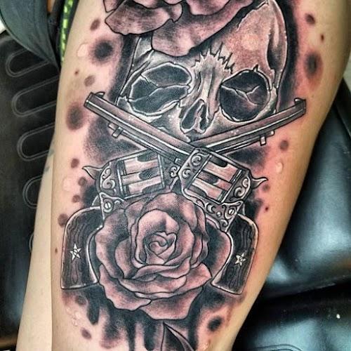 Tattoo Warehouse AND Body Piercings