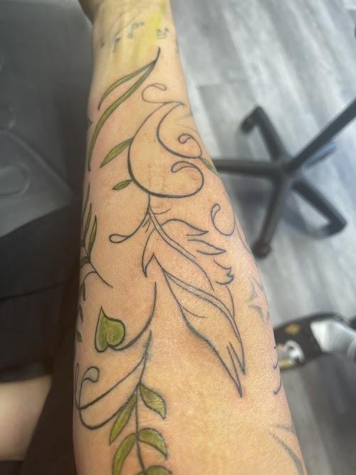Top Tier Tattoos and Body Piercings