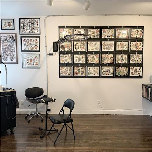 Promised Land Tattoo and Piercing