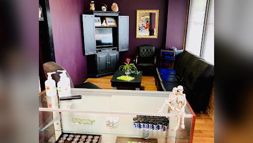 Cupid Slave Tattoo Company