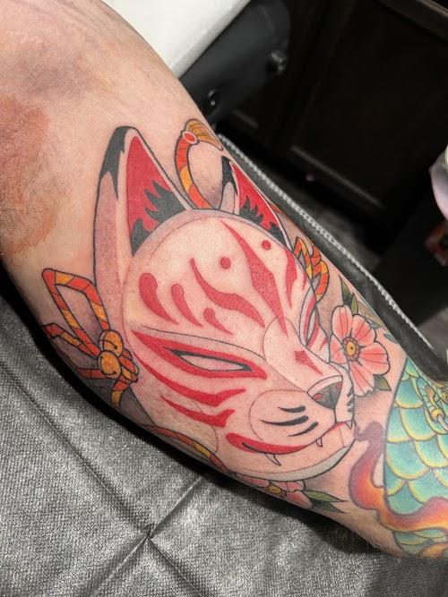 Custom Tattoos and Body Piercing Studio