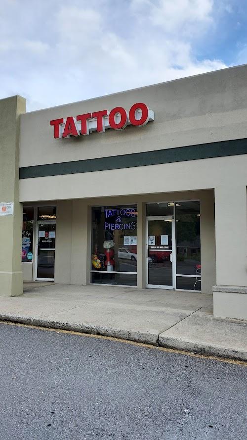 Kiss of Ink Tattoo